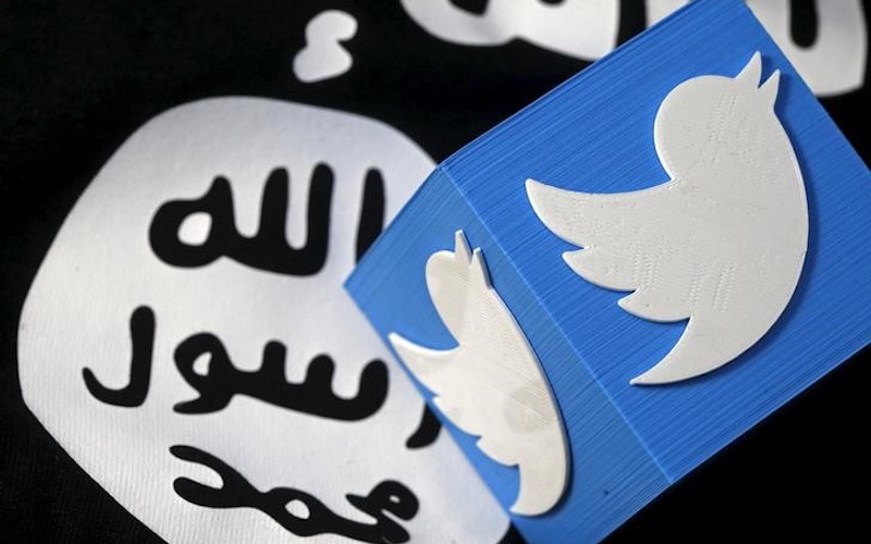 A 3D printed logo of Twitter and an Islamic State flag are seen in this picture illustration taken February 18, 2016. REUTERS/Dado Ruvic/Illustration