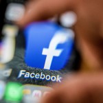 An illustration picture taken through a magnifying glass on March 28, 2018 in Moscow shows the icon for the social networking app Facebook on a smart phone screen.
Facebook said on March 28, 2018 it would overhaul its privacy settings tools to put users "more in control" of their information on the social media website. The updates include improving ease of access to Facebook's user settings, a privacy shortcuts menu and tools to search for, download and delete personal data stored by Facebook. / AFP PHOTO / Mladen ANTONOV        (Photo credit should read MLADEN ANTONOV/AFP/Getty Images)