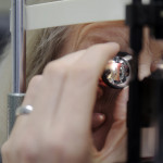 The pupil of a glaucoma patient, the recipient of an ocular implant manufactured by PolyActiva Pty Ltd., is seen through a magnifying lens during an examination at the Center for Eye Research Australia in Melbourne, Australia, on Tuesday, Aug. 21, 2018. The experimental ocular implant for treating glaucoma, the first of its kind, dispenses a constant daily dose of medicine as it dissolves over six months. Photographer: Carla Gottgens/Bloomberg via Getty Images