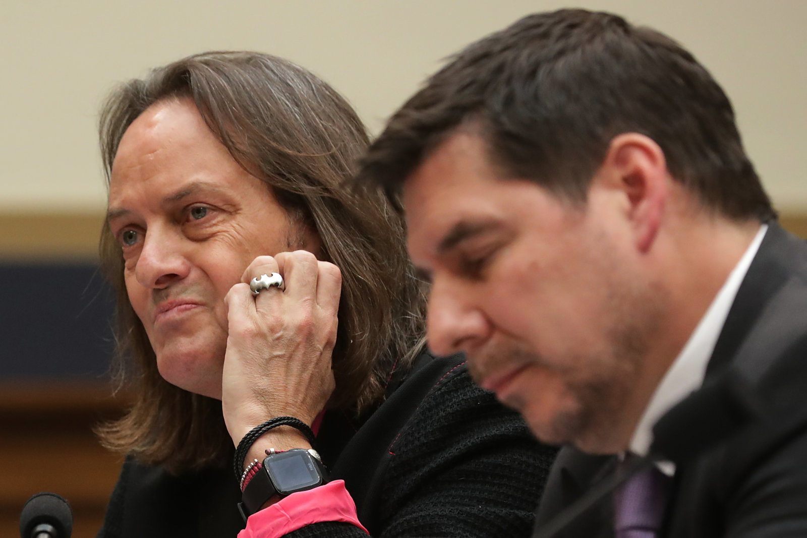 WASHINGTON, DC - MARCH 12:  T-Mobile CEO John Legere (L) and Sprint Executive Chairman Marcelo Claure testify before the House Judiciary Committee's Antitrust, Commercial and Administrative Law Subcommittee in the Rayburn House Office Building on Capitol Hill March 12, 2019 in Washington, DC. The corporate leaders and other experts testified about the "state of competition in the wireless market" and the possible impacts of the proposed merger of T-Mobile and Sprint would have on consumers in rural areas, workers and the future of 5G broadband internet access. (Photo by Chip Somodevilla/Getty Images)