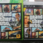 NEW YORK, NY - SEPTEMBER 18:  Copies of Grand Theft Auto V are displayed at the 8 Bit & Up video games shop in Manhattan's East Village on September 18, 2013 in New York City. The video game raked in more than $800 million in sales in its first 24 hours on the shelves.  (Photo Illustration by Mario Tama/Getty Images)