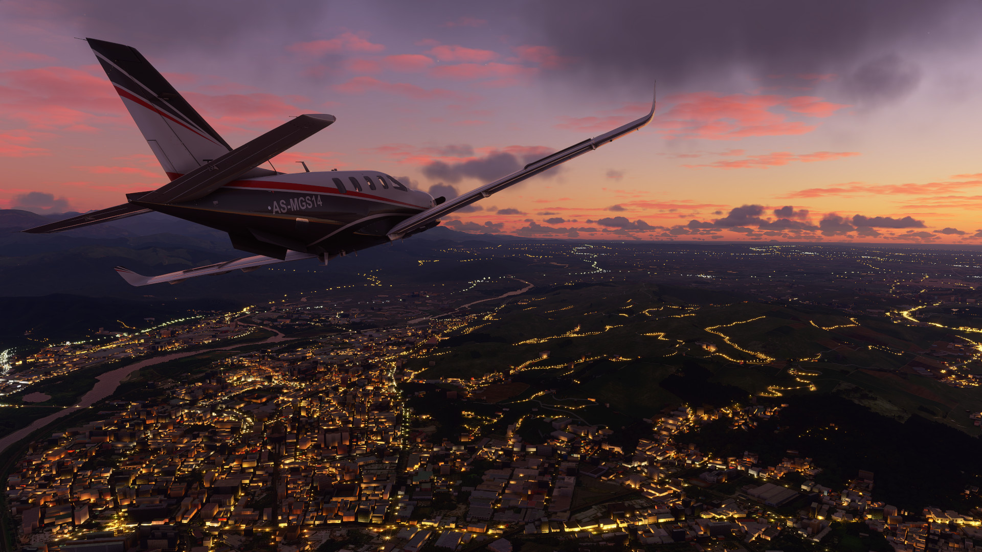 An aircraft flying over a city at sunset in Microsoft Flight Simulator